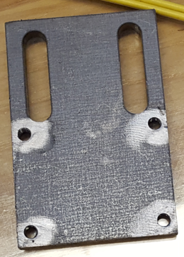 SOLENOID ADJUSTING PLATE